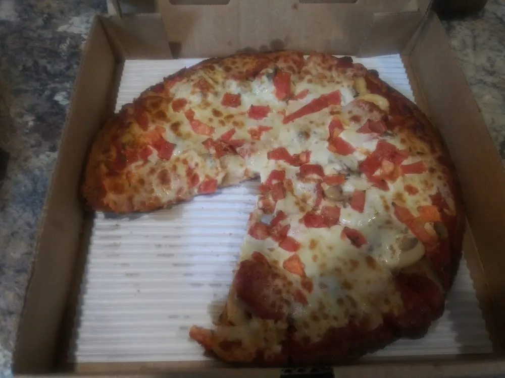 Cauliflower Crust Pizza with Mushrooms Pepperoni and Tomato